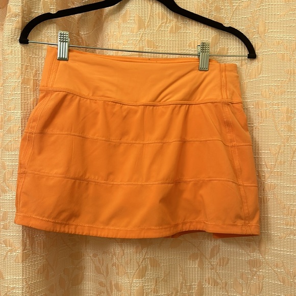 Lululemon pace rival skirt. Amazing condition. Size 4. Salmon/light orange pink - Picture 2 of 7